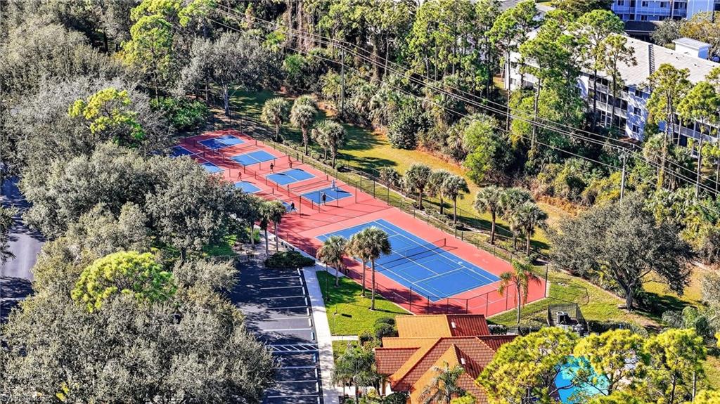 209 Robin Hood Circle, Unit 201 Naples, FL 34104 - Photo 23 of 29 an aerial view of a house