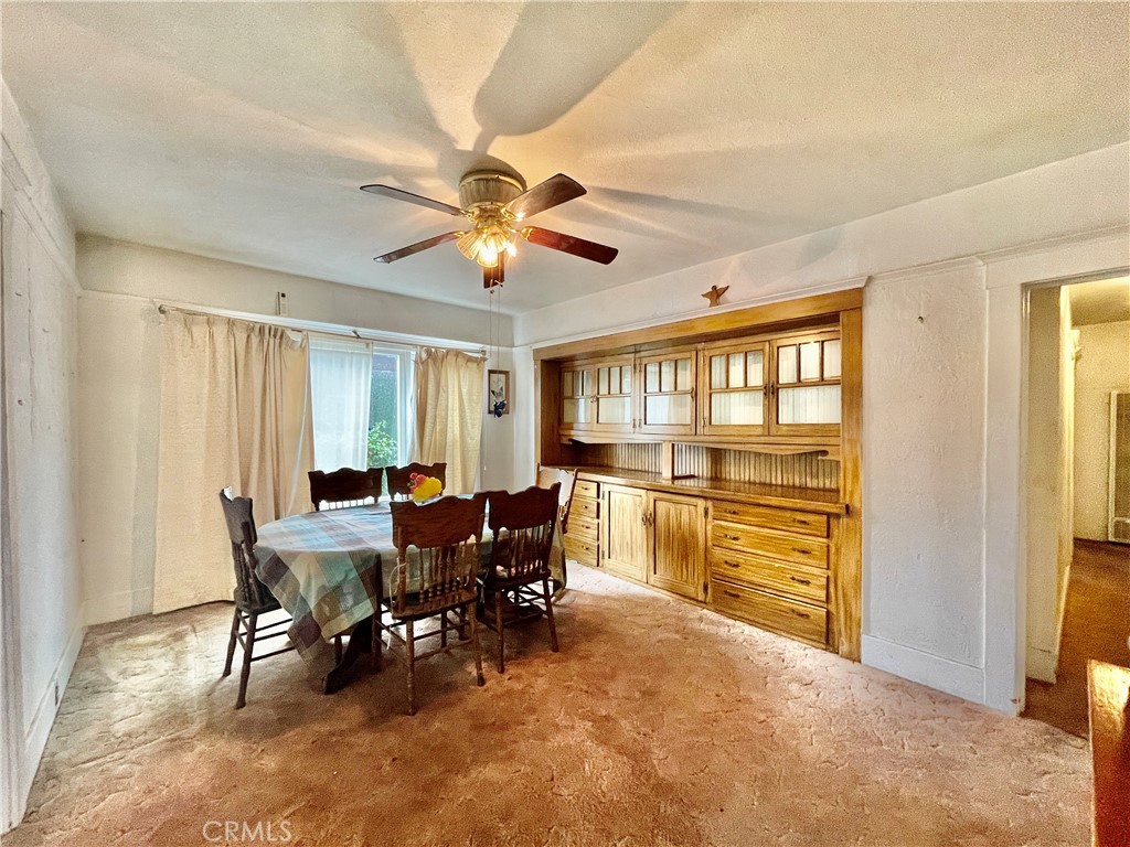 4474 Highland Place Riverside, CA 92506 - Photo 14 of 22 a view of a dining room with furniture window and outside view