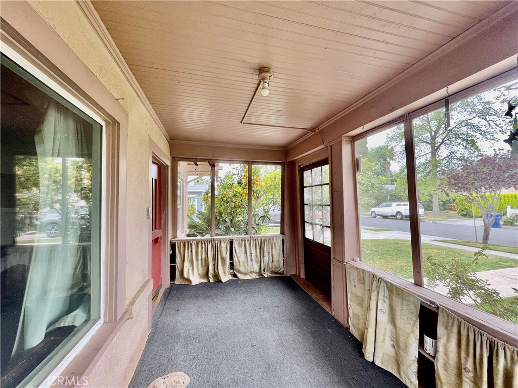 4474 Highland Place Riverside, CA 92506 - Photo 2 of 22 a view of an empty room with wooden floor and walls