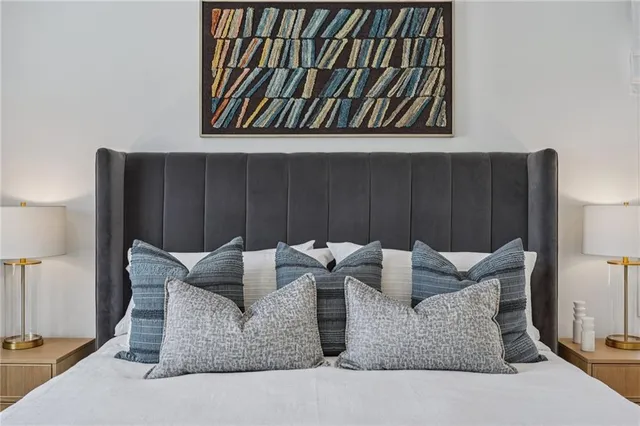 a large kitchen with kitchen island a sink a counter top space and stainless steel appliances