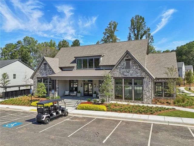 a view of a dining room with furniture and window