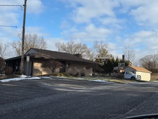 a view of street along with trees