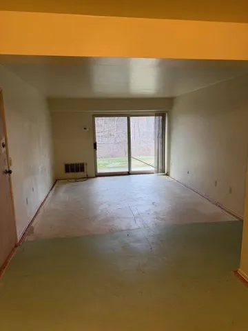 an empty room with windows