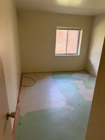 an empty room with a window