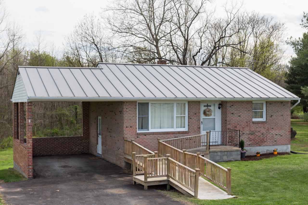 1119 North River Road Mount Solon, VA 22843 - Photo 1 of 24 a view of house with backyard and glass windows
