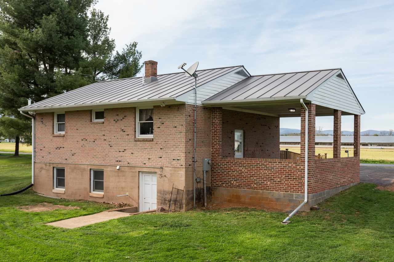 1119 North River Road Mount Solon, VA 22843 - Photo 19 of 24 a front view of a house with garden