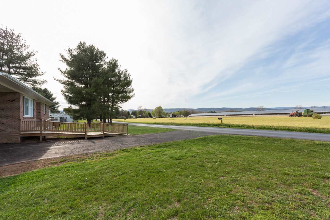 1119 North River Road Mount Solon, VA 22843 - Photo 24 of 24 a view of a swimming pool with an outdoor space and seating area
