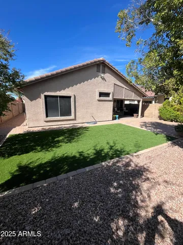 a front view of house with a yard