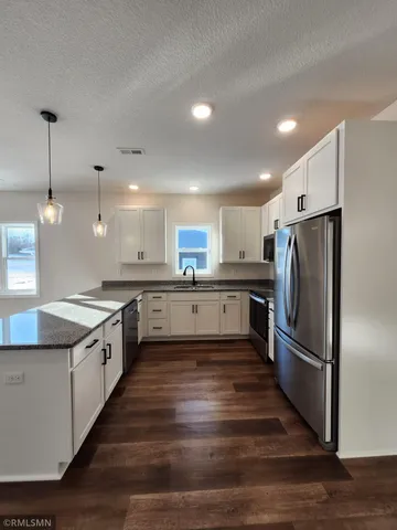 $299,900 | 410 Finvold Street, Woodville, WI 54028