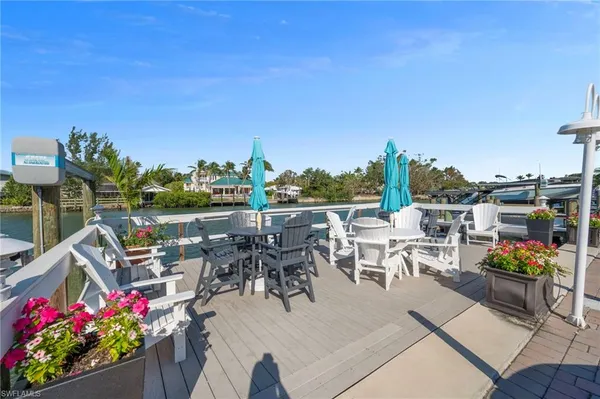 a view of a tables and chairs in patio