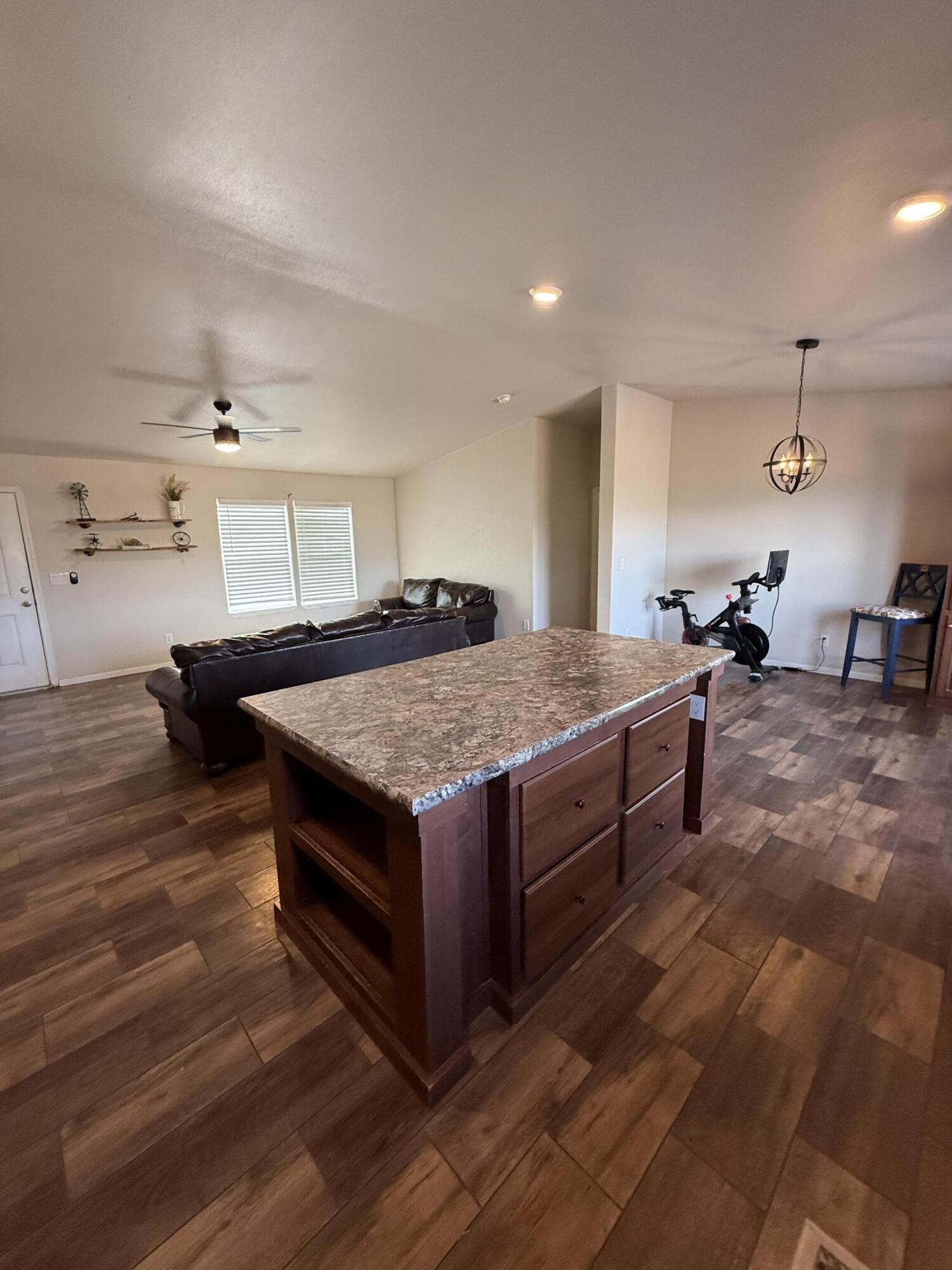 345 Old Mill Road Tonto Basin, AZ 85553 - Photo 7 of 33 a kitchen with stainless steel appliances granite countertop a stove and a sink