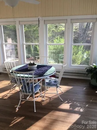 a dining room table and a table in a living room