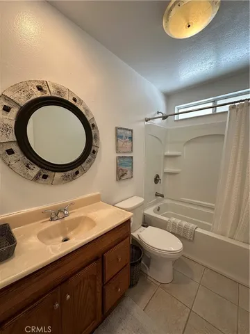 a view of walk in closet with wooden floor