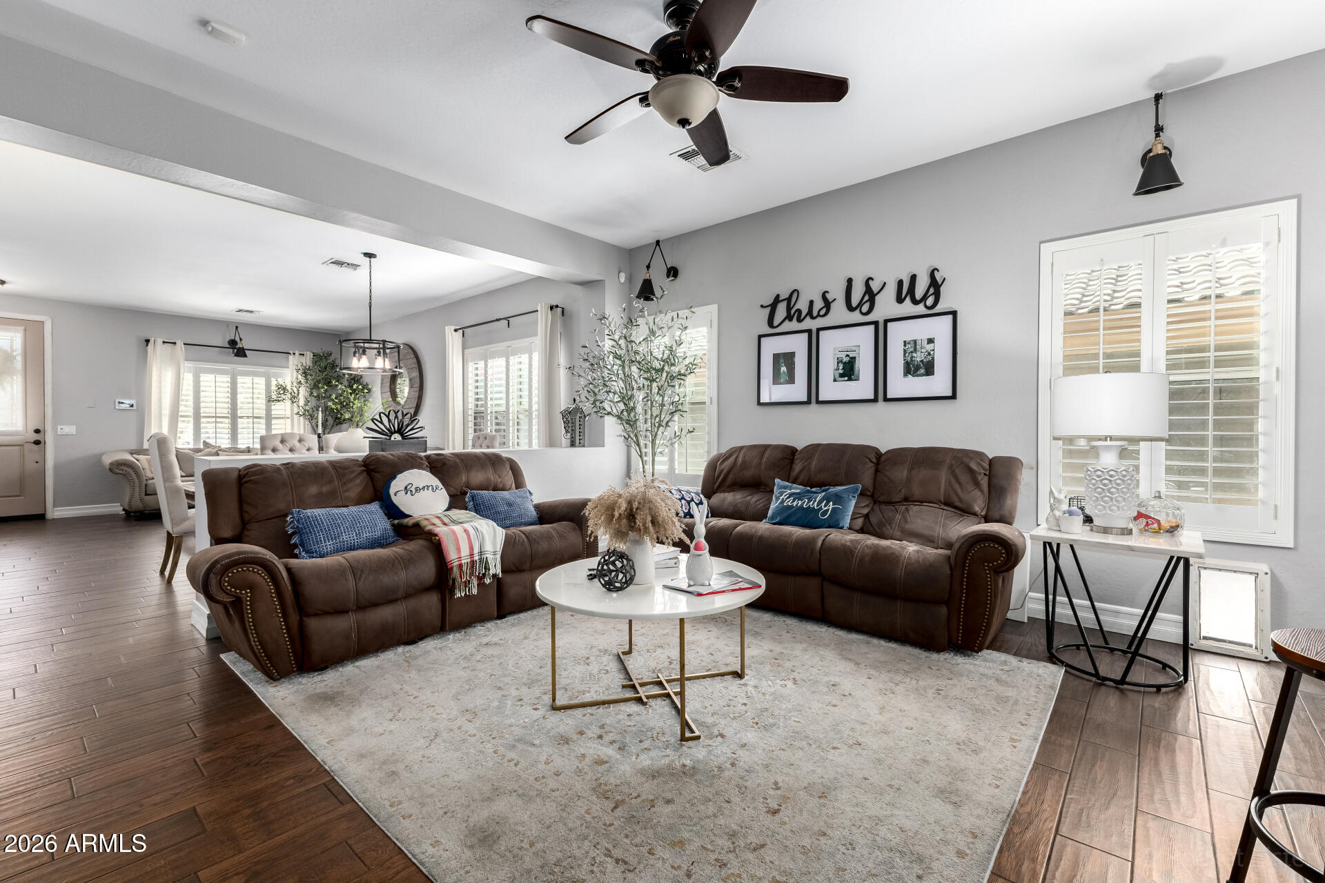 9646 West Payson Road Tolleson, AZ 85353 - Photo 13 of 36 a living room with furniture and a large window