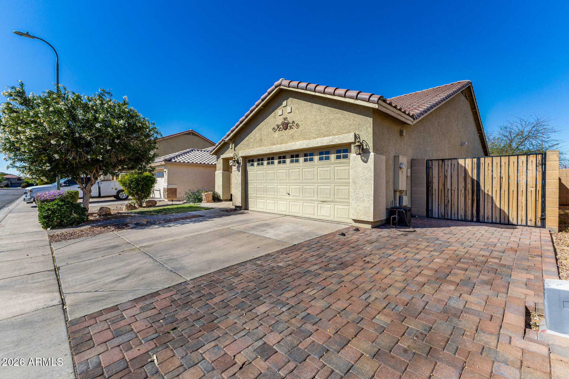 9646 West Payson Road Tolleson, AZ 85353 - Photo 3 of 36 a view of house with street