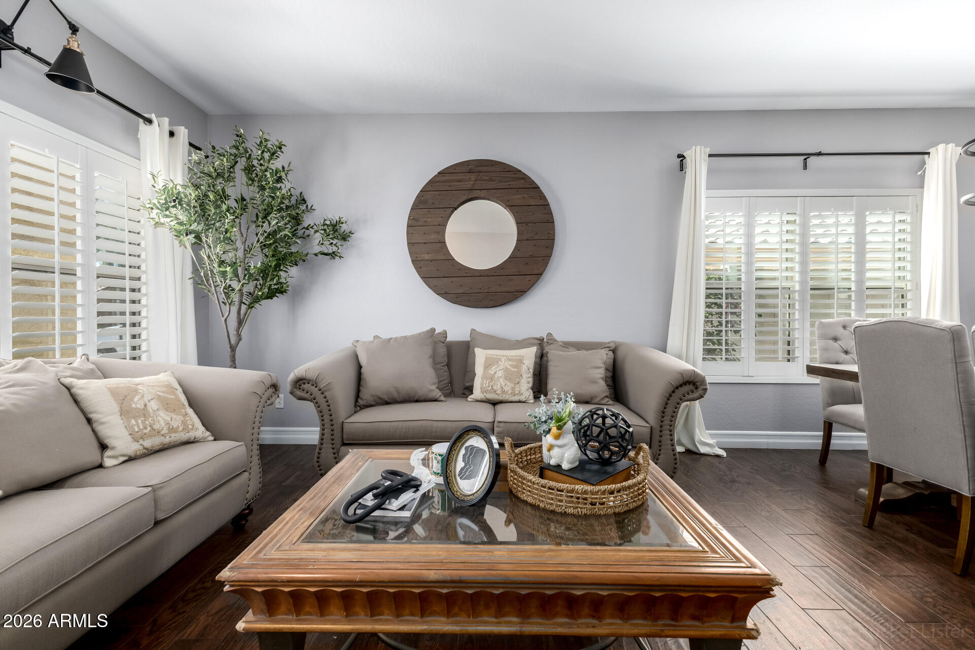 9646 West Payson Road Tolleson, AZ 85353 - Photo 8 of 36 a living room with furniture and a large window