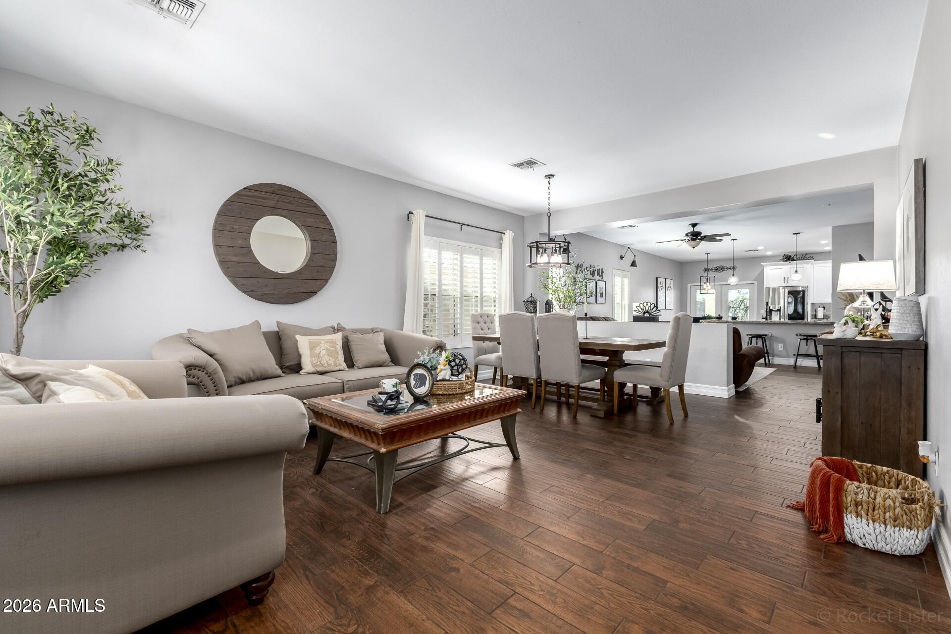 9646 West Payson Road Tolleson, AZ 85353 - Photo 9 of 36 a living room with furniture and wooden floor