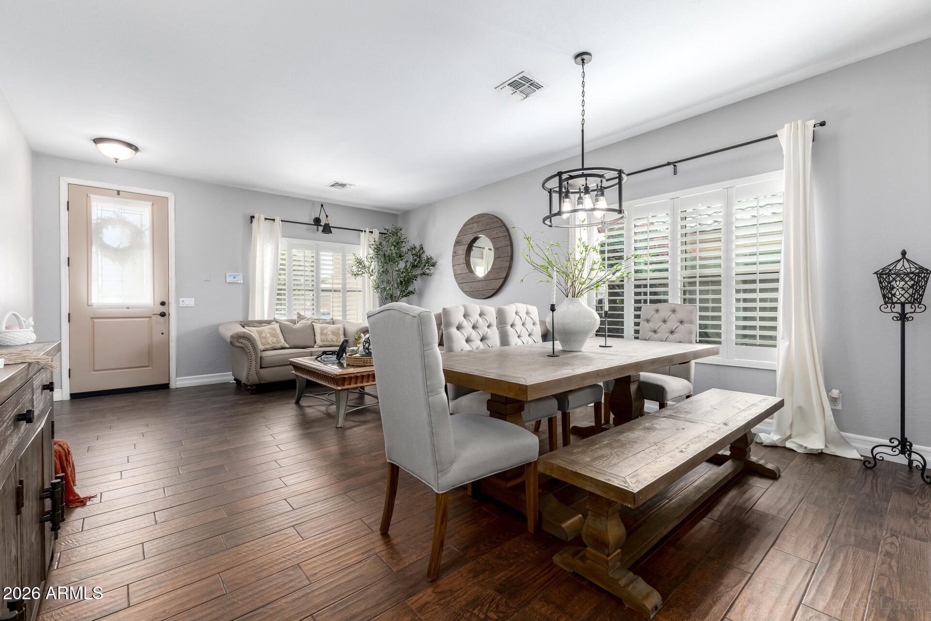 9646 West Payson Road Tolleson, AZ 85353 - Photo 10 of 36 a living room with furniture and a window