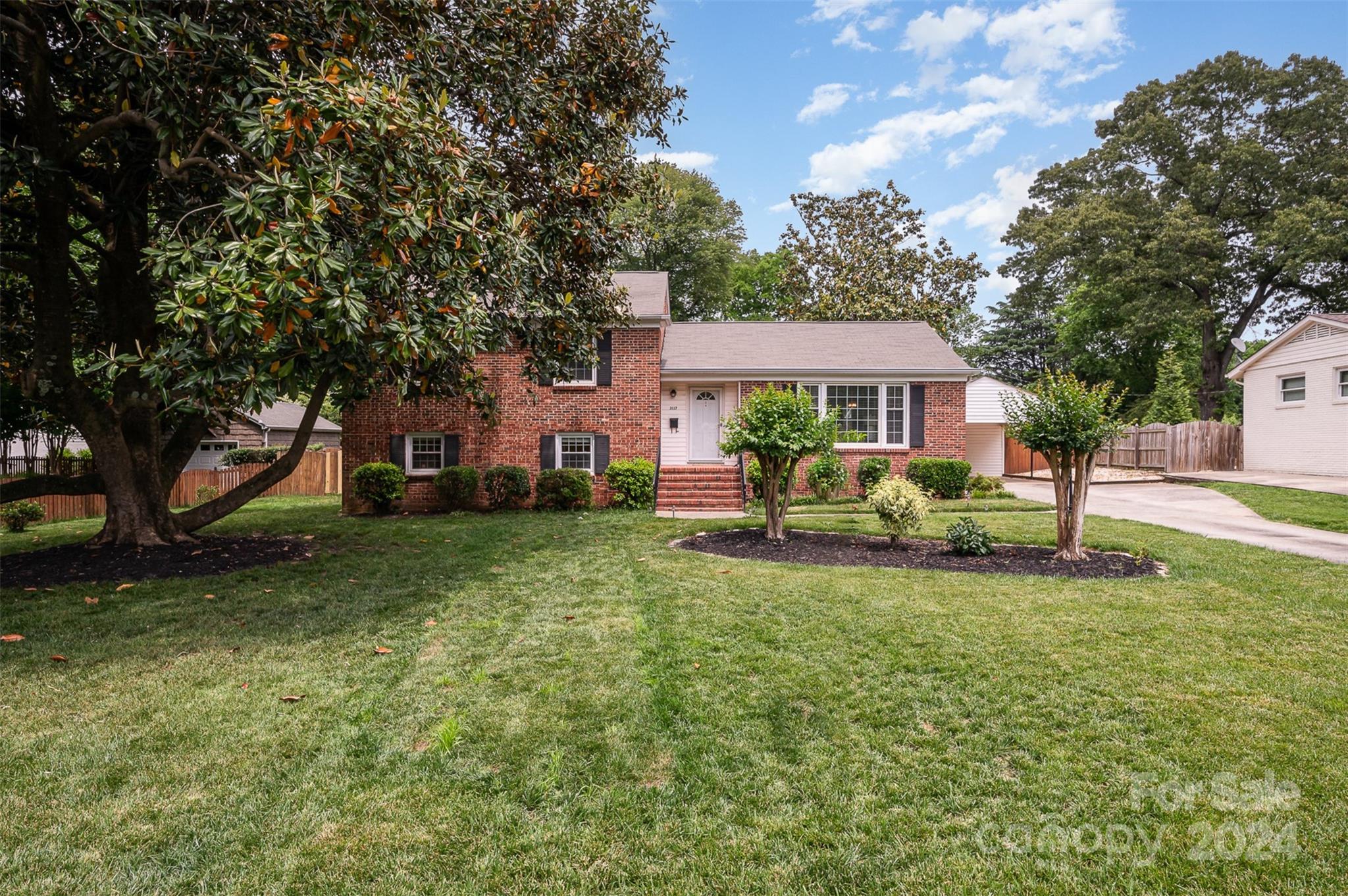 3117 Pendleton Avenue Charlotte, NC 28210 - Photo 1 of 25 a view of a house with a back yard