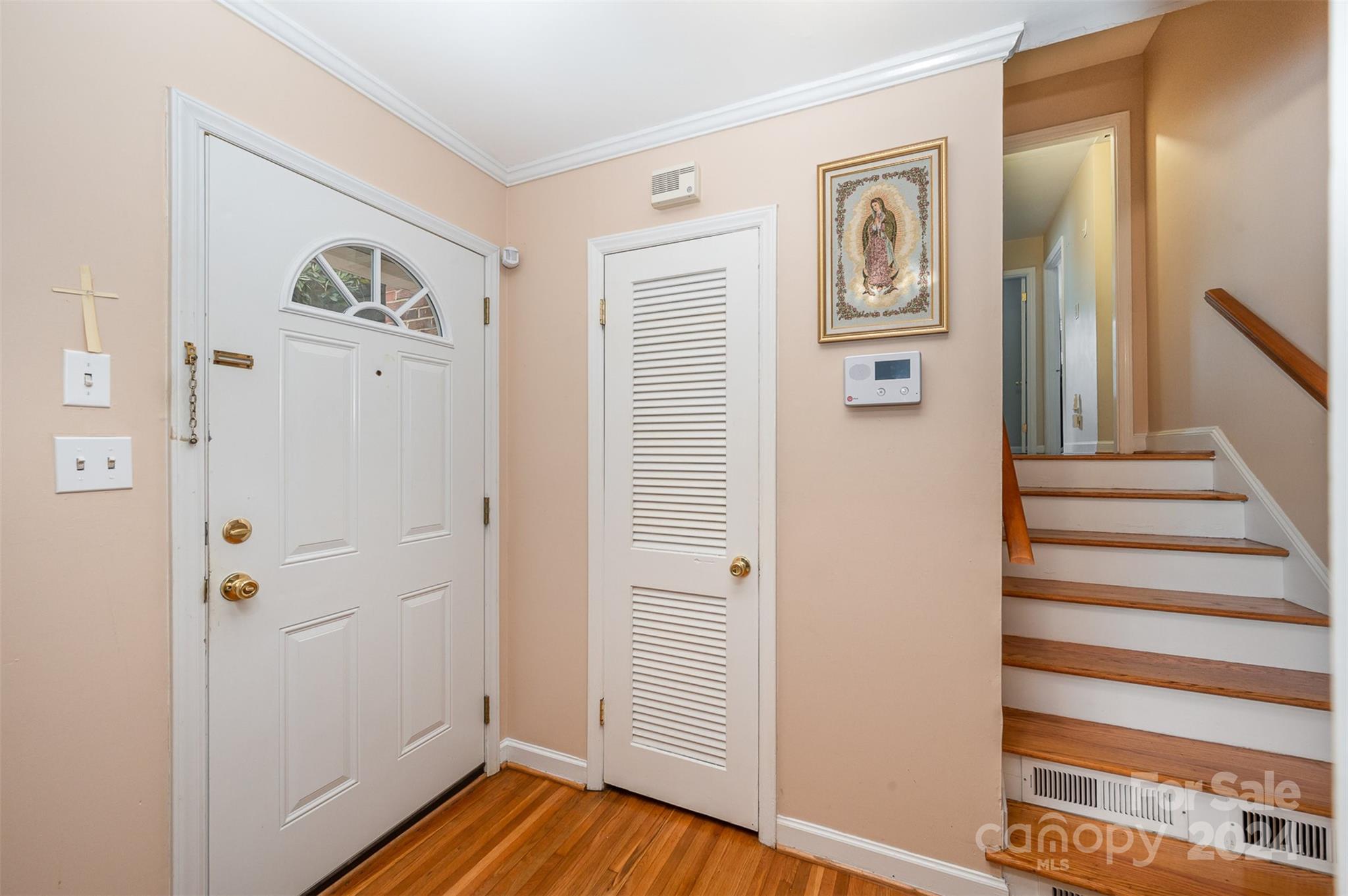 3117 Pendleton Avenue Charlotte, NC 28210 - Photo 6 of 25 a view of a hallway with wooden floor and entryway