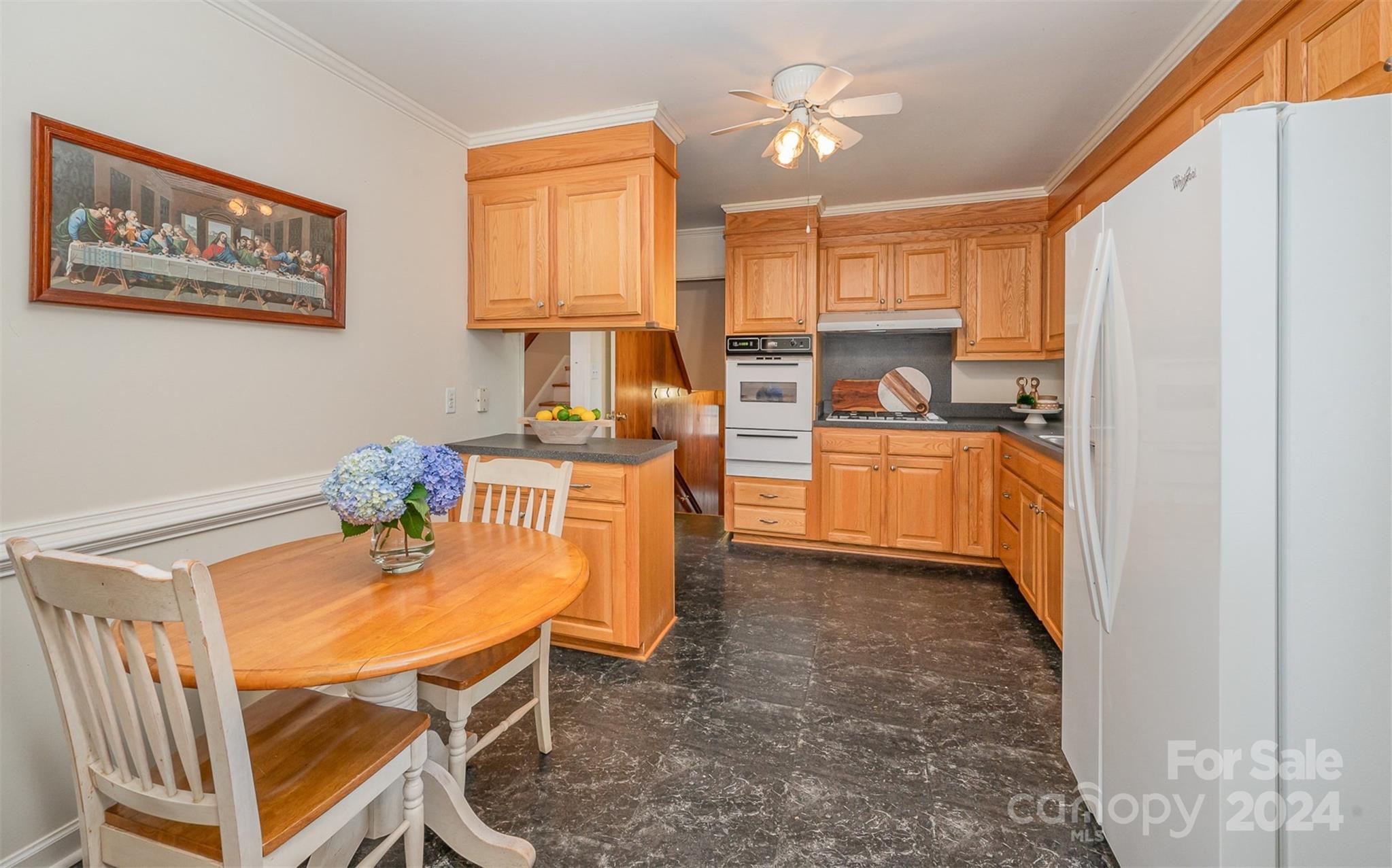 3117 Pendleton Avenue Charlotte, NC 28210 - Photo 8 of 25 a kitchen with stainless steel appliances kitchen island granite countertop a sink and cabinets