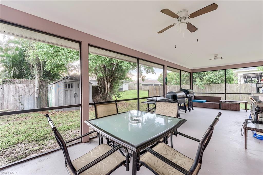 18257 Huckleberry Road Fort Myers, FL 33967 - Photo 16 of 18 a view of a dining room with furniture window and outside view