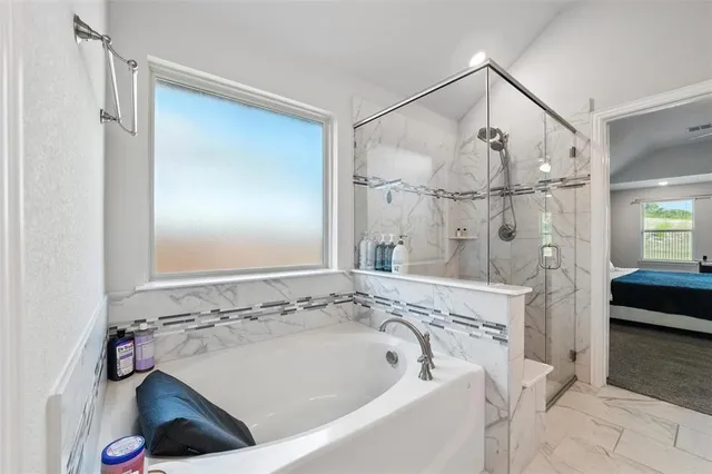 a bathroom with a double vanity sink mirror and