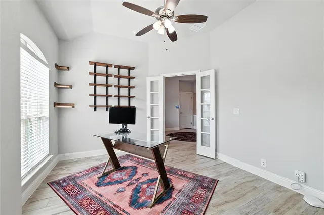 a workspace with furniture and a window