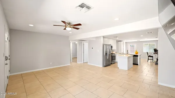 a view of a house with a snow on the road