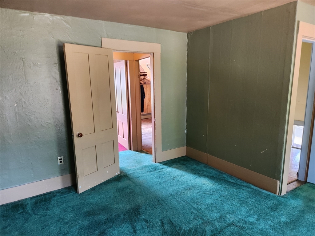 47 Beech Street Winchendon, MA 01475 - Photo 14 of 17 an empty room with an entrance door
