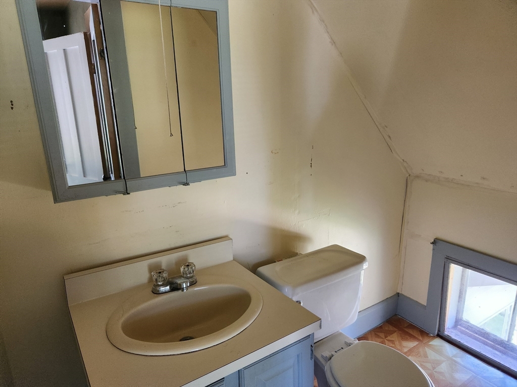 47 Beech Street Winchendon, MA 01475 - Photo 16 of 17 a bathroom with a sink and a mirror