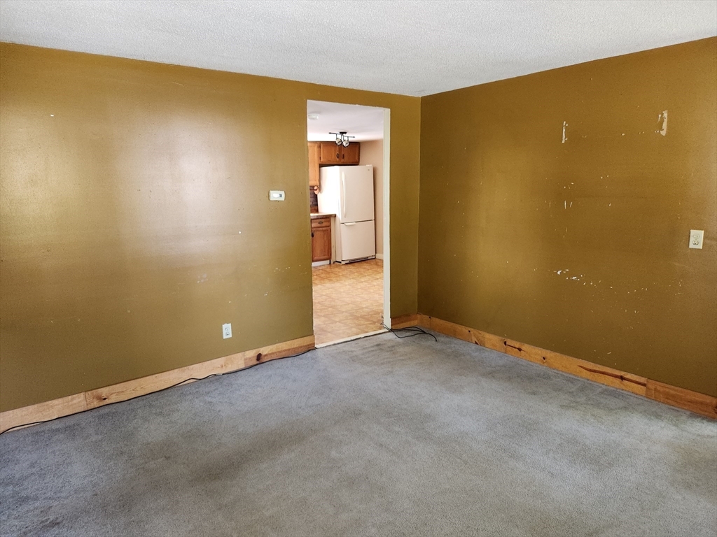 47 Beech Street Winchendon, MA 01475 - Photo 7 of 17 an empty room with a empty space and a window