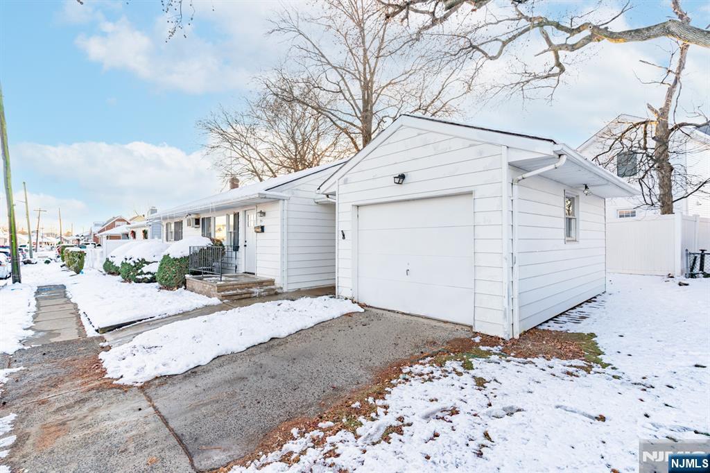 751 Hanson Avenue Perth Amboy, NJ 08861 - Photo 24 of 25 a view of a house with a snow