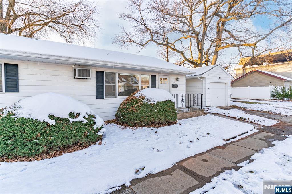 751 Hanson Avenue Perth Amboy, NJ 08861 - Photo 25 of 25 front view of a house with a yard