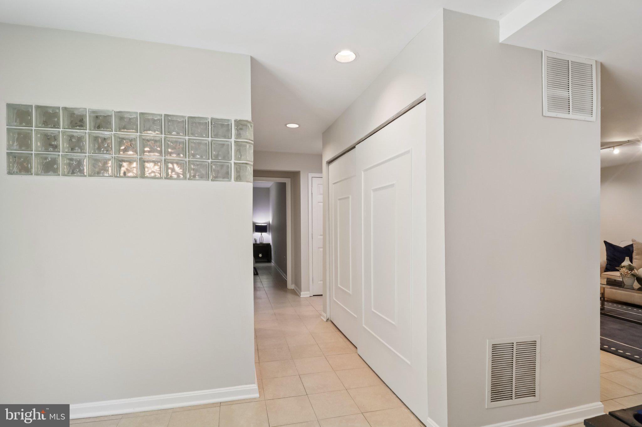 13229 Osterport Drive Silver Spring, MD 20906 - Photo 16 of 40 a view of hallway with windows