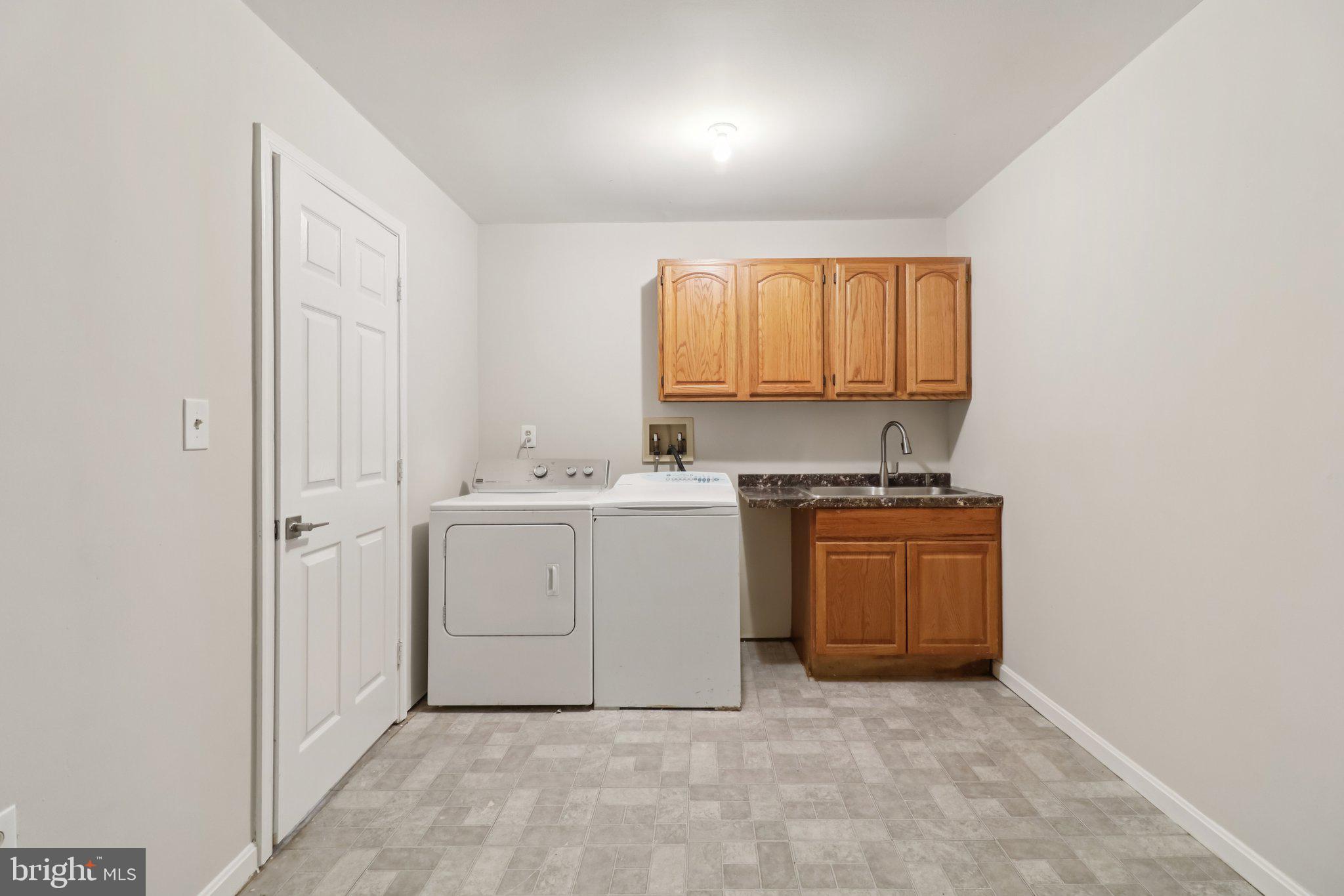 13229 Osterport Drive Silver Spring, MD 20906 - Photo 20 of 40 a view of a storage & utility room in a house