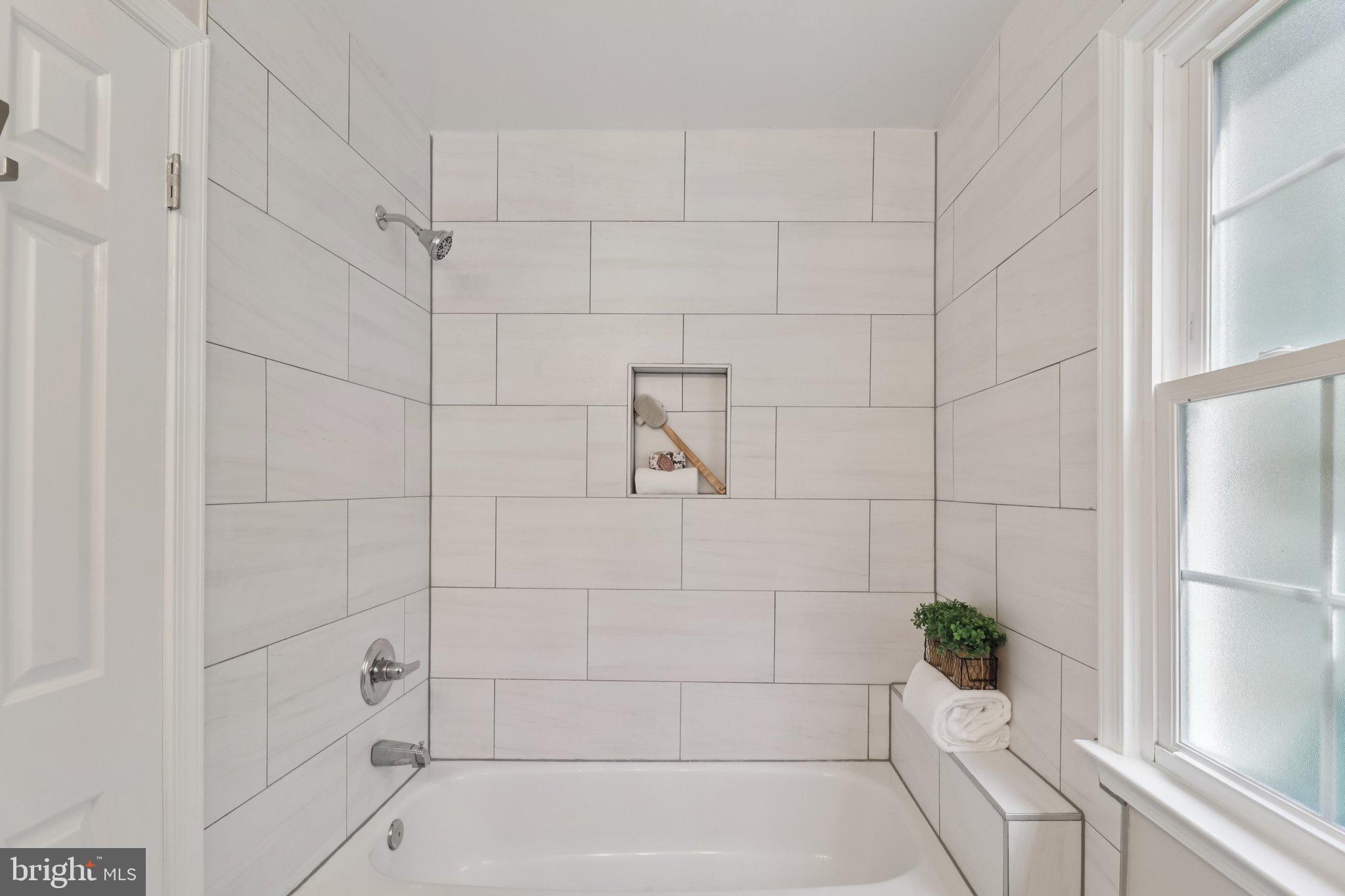 13229 Osterport Drive Silver Spring, MD 20906 - Photo 26 of 40 a bathroom with a bathtub