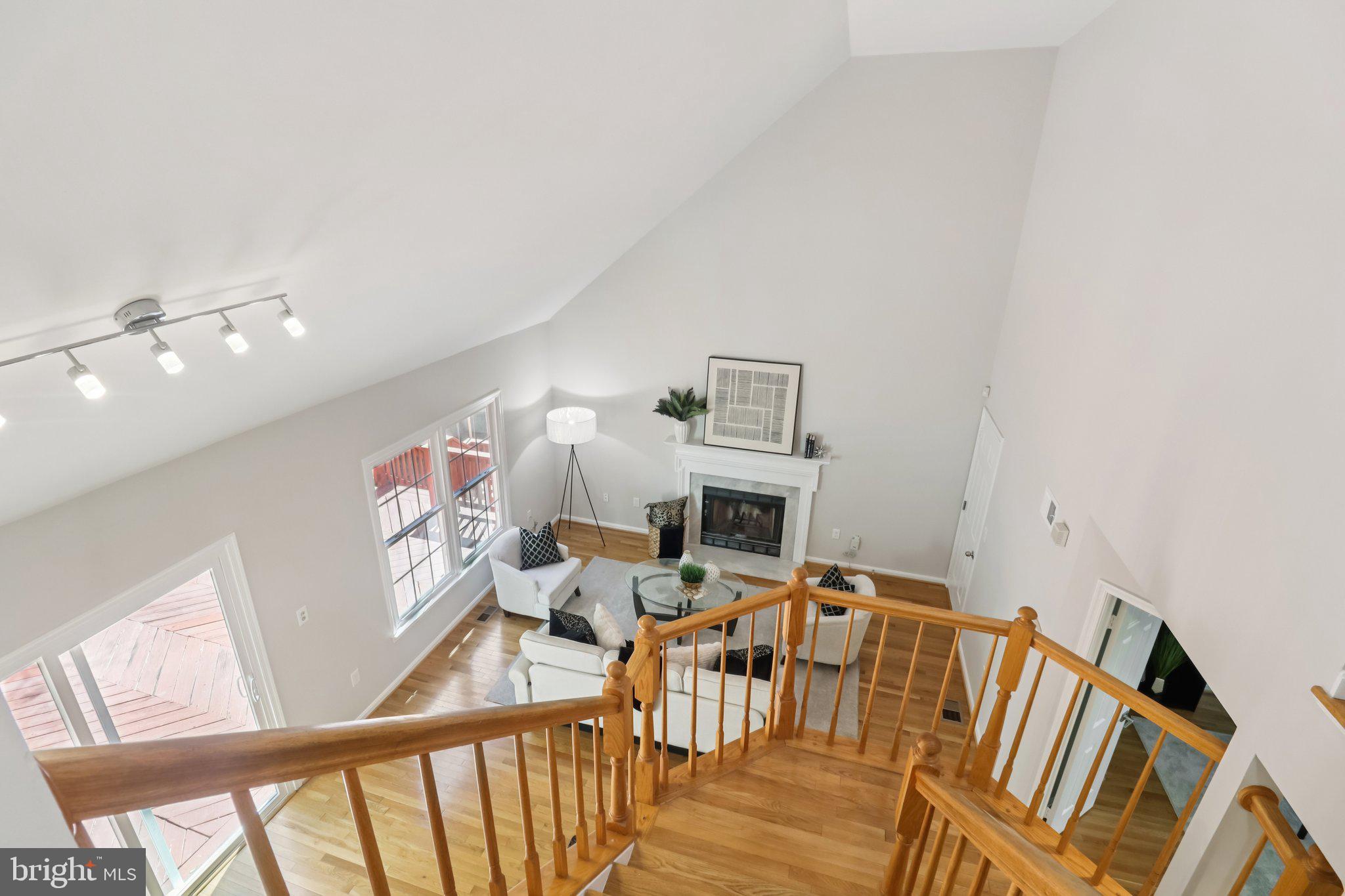 13229 Osterport Drive Silver Spring, MD 20906 - Photo 28 of 40 a view of a livingroom with furniture wooden floor and window