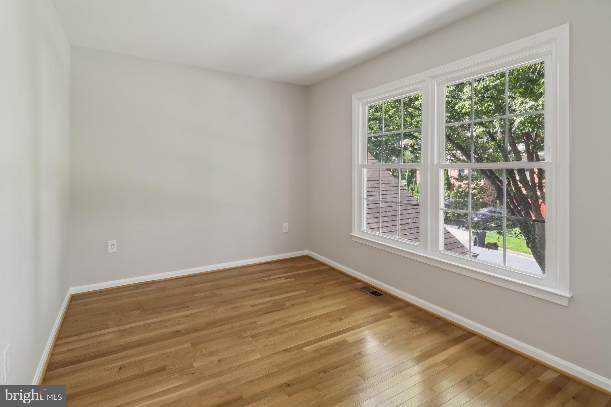 13229 Osterport Drive Silver Spring, MD 20906 - Photo 30 of 40 a view of an empty room with a window