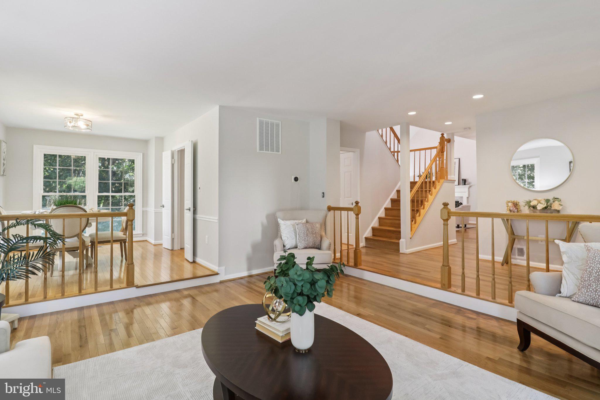 13229 Osterport Drive Silver Spring, MD 20906 - Photo 6 of 40 a view of a living room and dining room