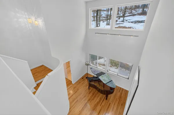 a view of workspace with wooden floor