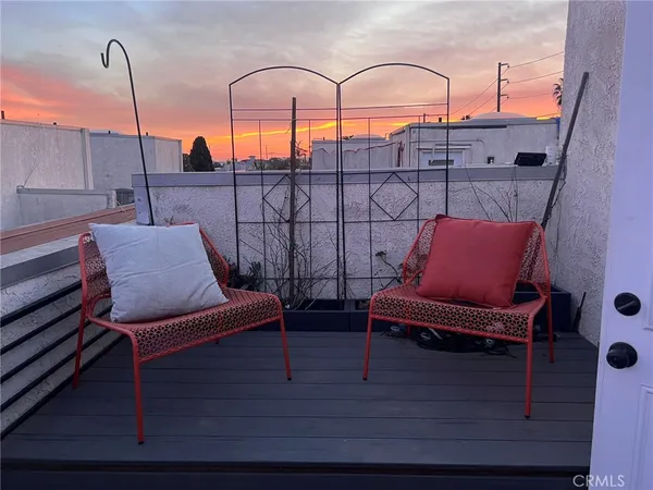 a building view with outdoor seating space