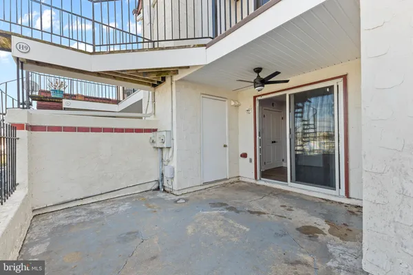 a city view with tall buildings and a yard