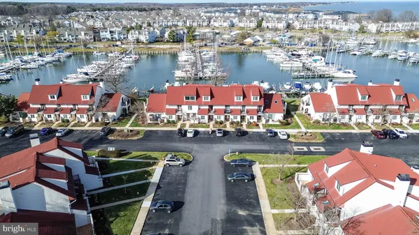 an aerial view of a house with a lake view