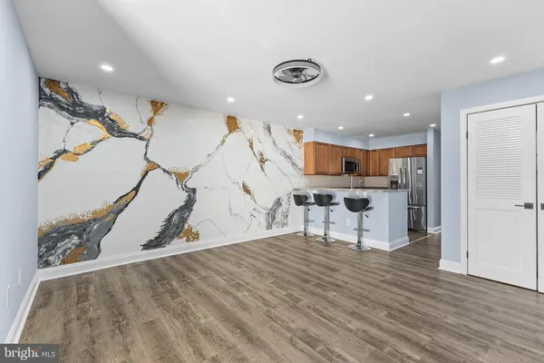 a view of kitchen and natural light