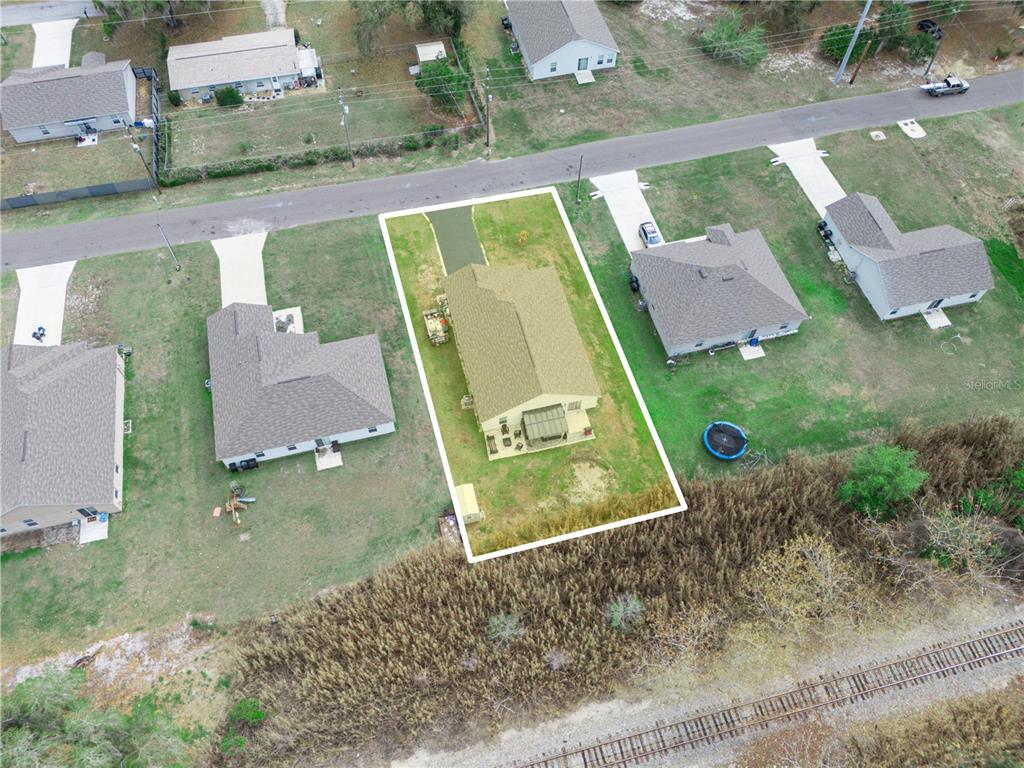 266 South Lake Avenue Frostproof, FL 33843 - Photo 37 of 42 an aerial view of a house