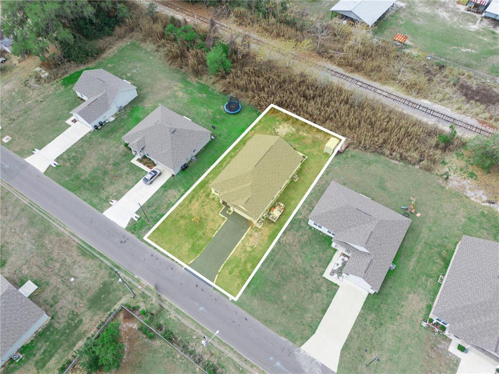 266 South Lake Avenue Frostproof, FL 33843 - Photo 40 of 42 an aerial view of a house