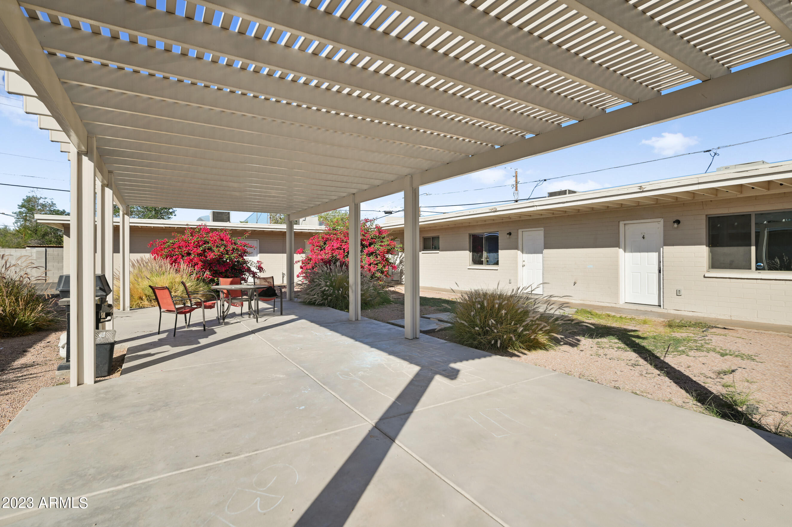 3949 East Earll Drive, Unit 4 Phoenix, AZ 85018 - Photo 2 of 11 a view of a backyard