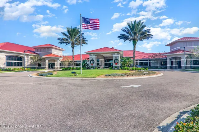 a view of street with flower on the side of it