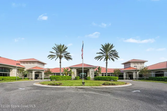 a view of a lake with a building in the background